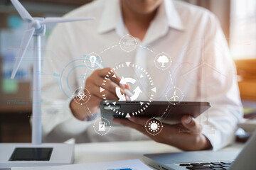 Business man using computer on CO2 emission reduction concept with global warming icon. along with climate, energy, sustainability, environment.