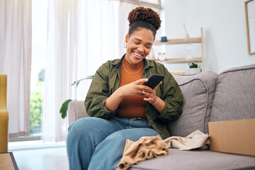 Online shopping, delivery and black woman with phone on sofa happy with package or product at home....