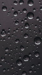 Gouttes d'eau et reflets sur du métal noir - Arrière plan sombre