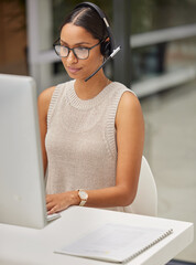 Business woman, call center and web support communication at a computer in a office. Phone...