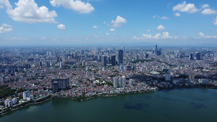 Fototapeta na wymiar Aerial view of Hanoi, capital of Vietnam. The West Lake, also known as Ho Tay lake, is seen in the bottom.