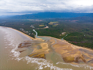aerial drone panorama of rollingstone creek river mouth in beautiful rural town balgal beach; unique coastline of  tropical north queensland near townsville, australia