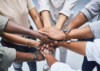 Hands, support and people together for teamwork, solidarity or group collaboration from above....