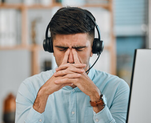 Stress, call center and headache of man in customer service agency with pain, burnout or anxiety....