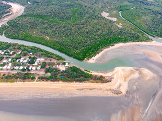 aerial drone panorama of rollingstone creek river mouth in beautiful rural town balgal beach; unique coastline of  tropical north queensland near townsville, australia