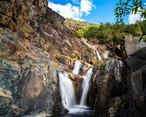 panorama of jourama falls in paluma range national park, north queensland, australia; cascade of numerous powerfull tropical waterfalls near townsville and ingham