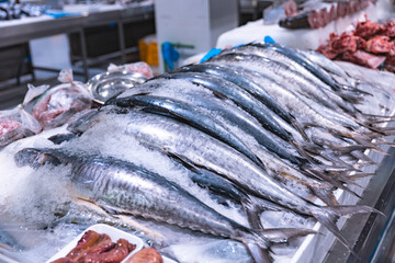 Emirates, Dubai, Deira waterfront fish market. Retailers offer fresh fish and crustaceans at their...