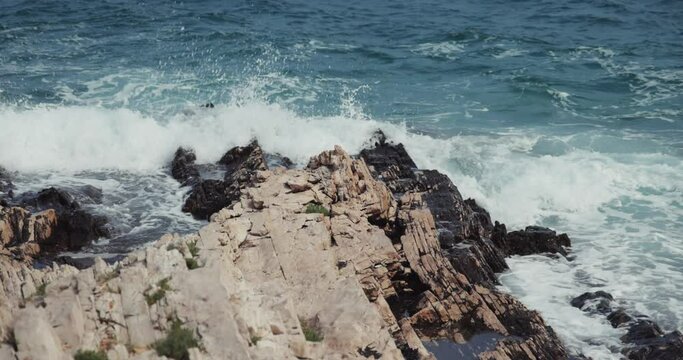 Jugo wind and waves on the rocky coast of the Adriatic Sea, Croatia
