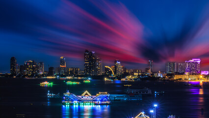 Cityscape over colors and the lights of pattaya and cruise ships in the sea, pattaya bay at night,...