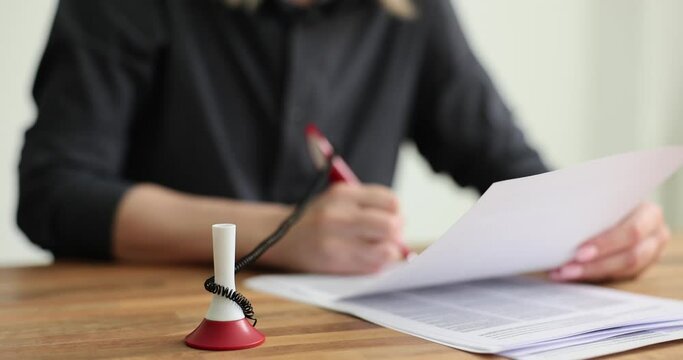 Businesswoman empowered to sign and sign contract concept. Realtor agent lawyer client signing official legal document