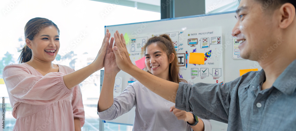 Poster group of designer cheerful giving high five on the success of website design and application on mobi