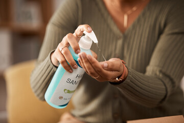 Closeup, hands and a person with sanitizer for medical safety and security from virus in a house....