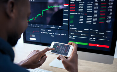 Phone, computer and corporate man with stock market statistics, NFT insight or investment data of IPO fintech company. Crypto trading, economy and African male trader reading finance accounting info