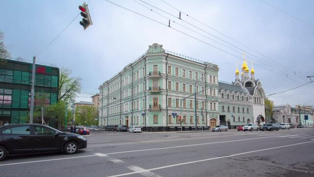 Building and church on Prospect Mira Street in Moscow timelapse hyperlapse. Prospekt Mira is located in Moscow's Meshchansky district. 4K