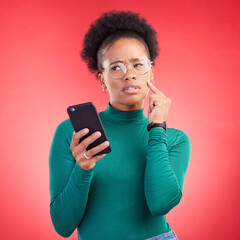 Thinking, phone and black woman in studio confused by text, application or how to steps on red...