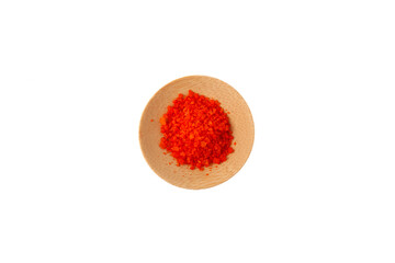 Tartrazine powder in wooden plate on white background,. top view. Food coloring. Food additive...
