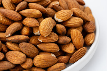Almond nuts close up. Nut almond close up. Product rich in minerals and vitamins. Almond kernels. Texture of Almond kernels.	
