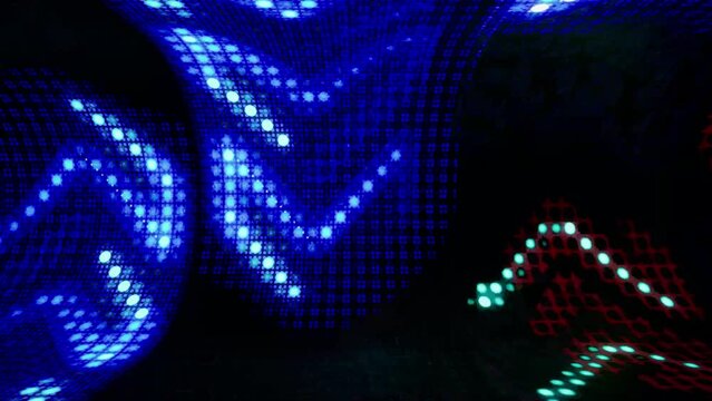  A bent wall like a tunnel on which arrows are projected with a glitch effect and many small dost pattern flickering.