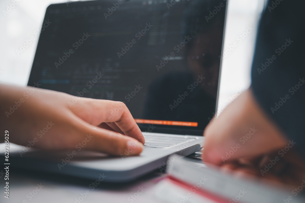 Fototapete Graphic designer architects who work with laptops and color comparison tables for design work..