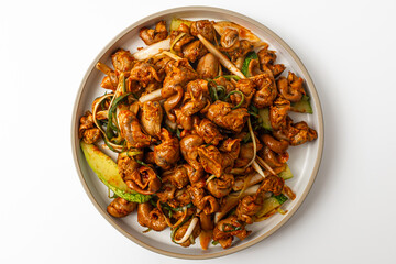 Whelk and vegetable seasoning on a white background