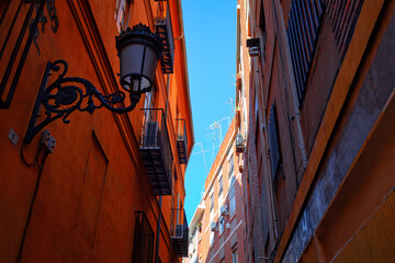 Narrow street in the old town of Granada, Andalusia, Spain