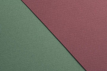 Fototapeta premium Rough kraft paper background, paper texture red burgundy green colors. Mockup with copy space for text.