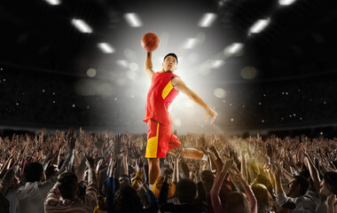 Collage with young asian basketball player with ball in hands jumping high over hands of fans. © Lustre Art Group 
