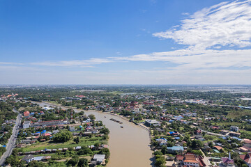 Aerial view of two communities along the Chao Phraya River in Ayutthaya, Thailand.