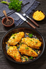 baked chicken breasts under cracker cheese crust