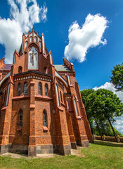 General view and architectural details in close-up and interior of the Catholic Church of Our Lady of the Angels built in 1914 in Lipsk, Podlasie, Poland. - obrazy, fototapety, plakaty