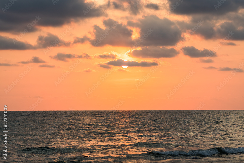 Sticker sunset on the beach