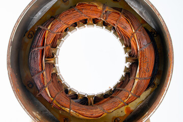 Old Field Coil Motor on a white background, A field coil is an electromagnet used to generate a...