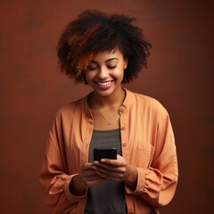 Fototapeta na wymiar Beautiful afro american girl with phone