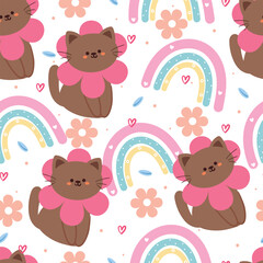seamless pattern cartoon cat with rainbow and flower. cute animal wallpaper for textile, gift wrap paper