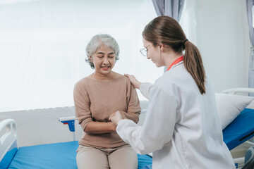 Young female doctor nurse caregiver caring happy senior grandmother helping old patients in rehabilitation at elderly health checkup