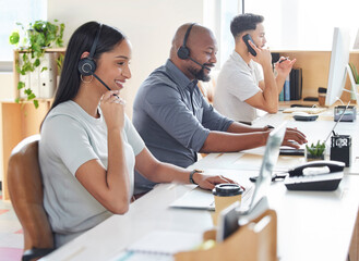 Call center, customer service or support with consultant people at work in an office for assistance. Contact us, crm or consulting with a group of employees using headset technology for telemarketing