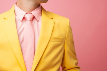 Unrecognizable stylish man guy male model in trendy yellow suit jacket fashion store clothes shop vivid clothing discount unknown businessman isolated against pink wall studio background business