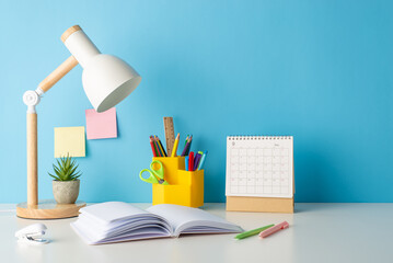 Study-ready arrangement: side view photo of a desk showcasing school essentials, such as stationery...