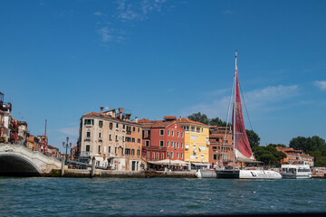 Fototapeta premium Murano Houses & Shops along with the channels Venice, Italy. Murano is famous by glass production factories