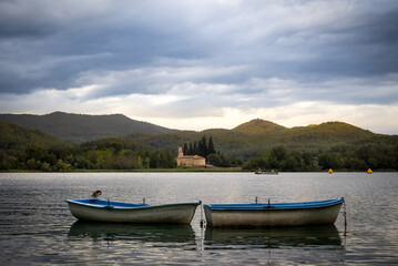 Beautiful moody lake with mountain background in the spanish city of Banyoles - Girona - Catalunya