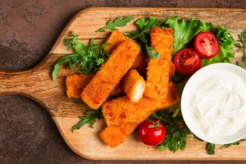 Poster fried fish nuggets, with white sauce, arugula and cherry, no people, © Gala_Didebashvili