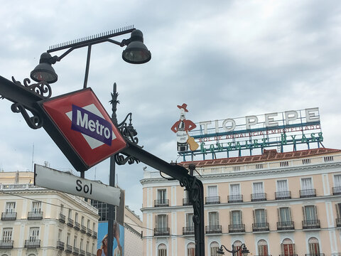 Madrid, Spain. 06 17 2019. Sol square, entrance to the subway and sign of the Tio Pepe winery. Emblematic symbols of the center of the city of Madrid.