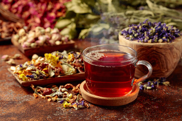 Herbal tea and a mix of various dried medicinal plants and herbs.