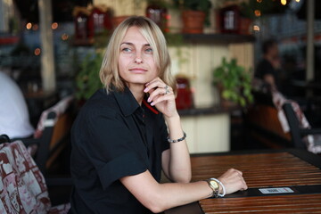 woman drinking coffee in cafe