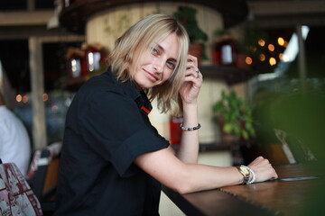 woman drinking coffee in cafe