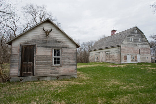 Old farmhouse and barn; Walton, Nebraska, United States of America