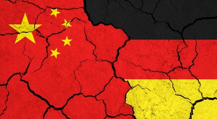Flags of China and Germany on cracked surface - politics, relationship concept