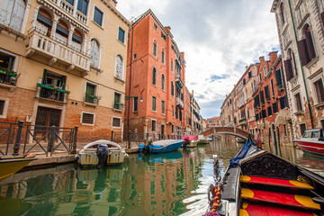 Beautiful view of a canal in Venice with gondolas, Venice, Italy, Europe.