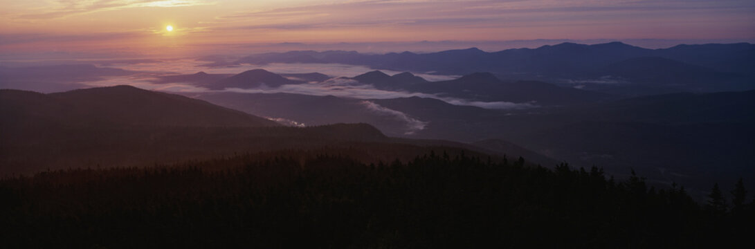 Wide-angle view of a sunrise from Whiteface Mountain in the Adirondack Mountains, New York, USA; New York, United States of America