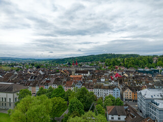 Fototapeta na wymiar Aerial view of Swiss City of Winterthur with the old town on a cloudy spring morning. Photo taken May 17th, 2023, Winterthur, Switzerland.